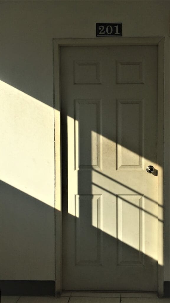 white wooden 6-panel door
